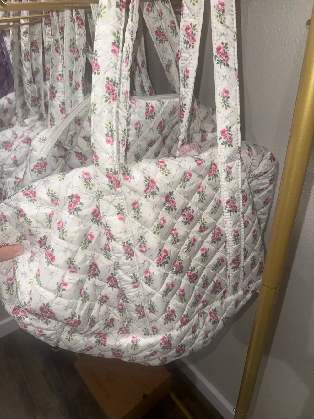 Floral quilted duffel bags